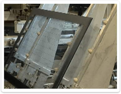 Tilting Conveyor for Easy Glass Loading