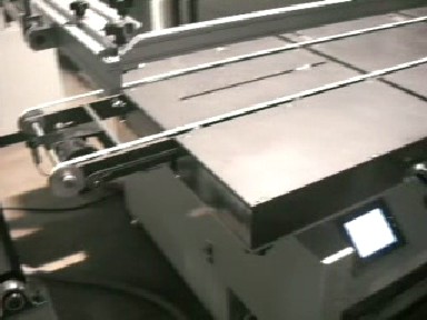 Conveyor Belt Driven by Motor Running Longitudinal along Glass Screen Printer
