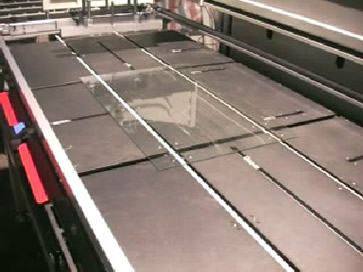 Conveyor Belts Bring Glass into Screen Printer & Stop at Correct Position within Positioning Pins