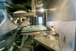 Autoglass-windshiledis-washed-and-entering-into-air-knives-drying-section.jpg